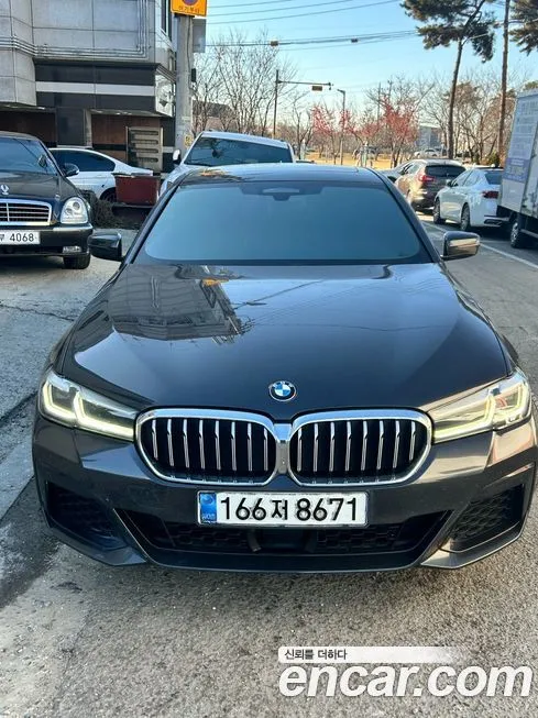 BMW 5-Series — фото 1