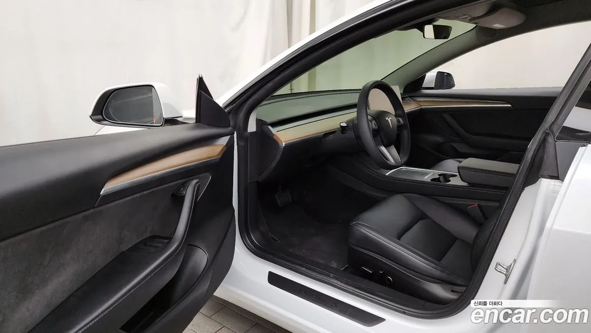 Tesla Model 3 — фото 10