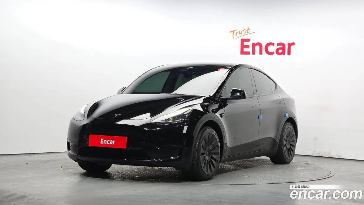 Tesla Model Y — фото 1
