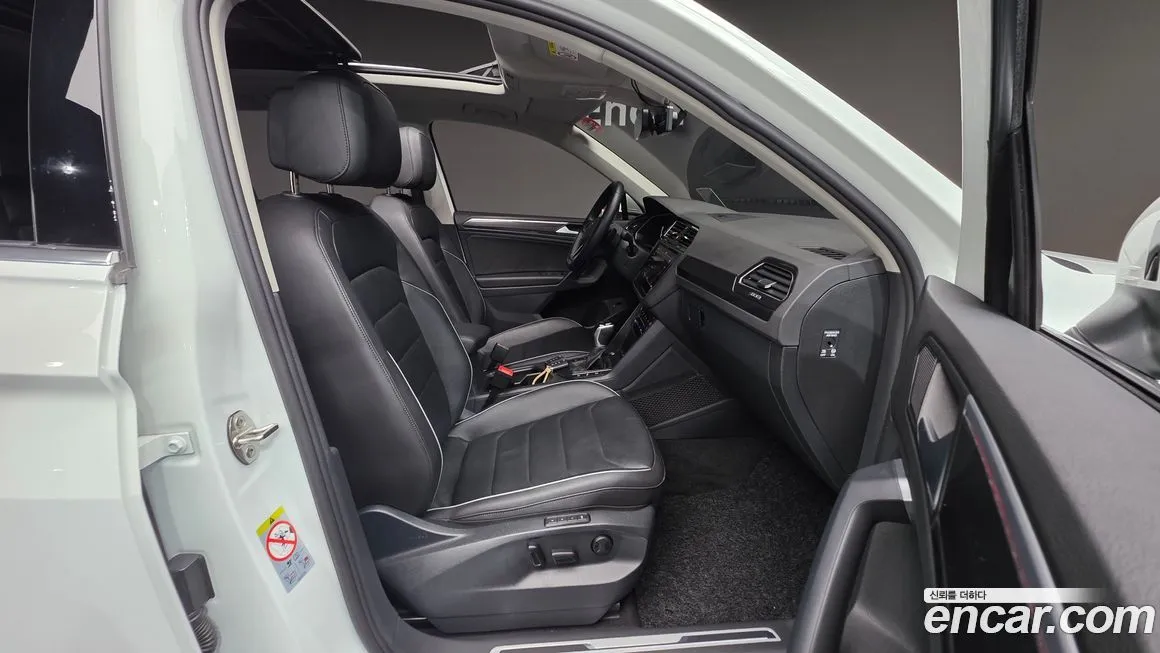 Volkswagen Tiguan — фото 10