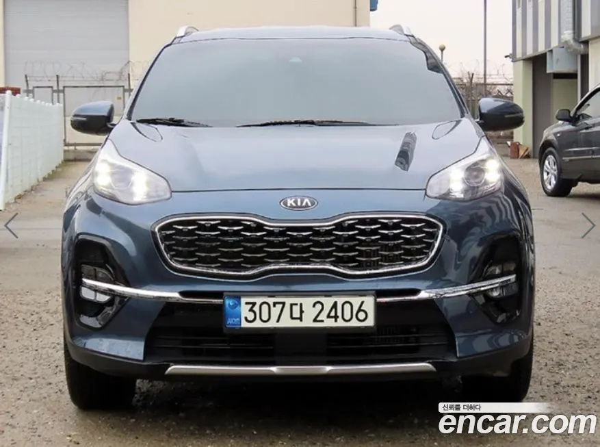 Kia Sportage — фото 1