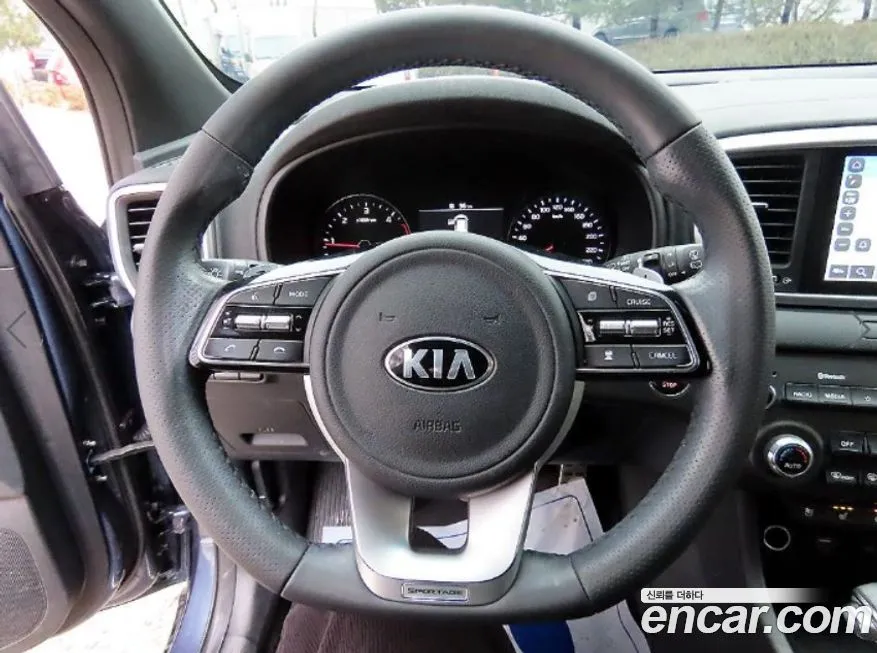 Kia Sportage — фото 8