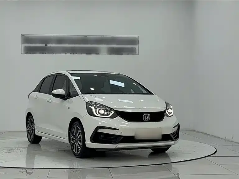 Honda Fit — фото 10