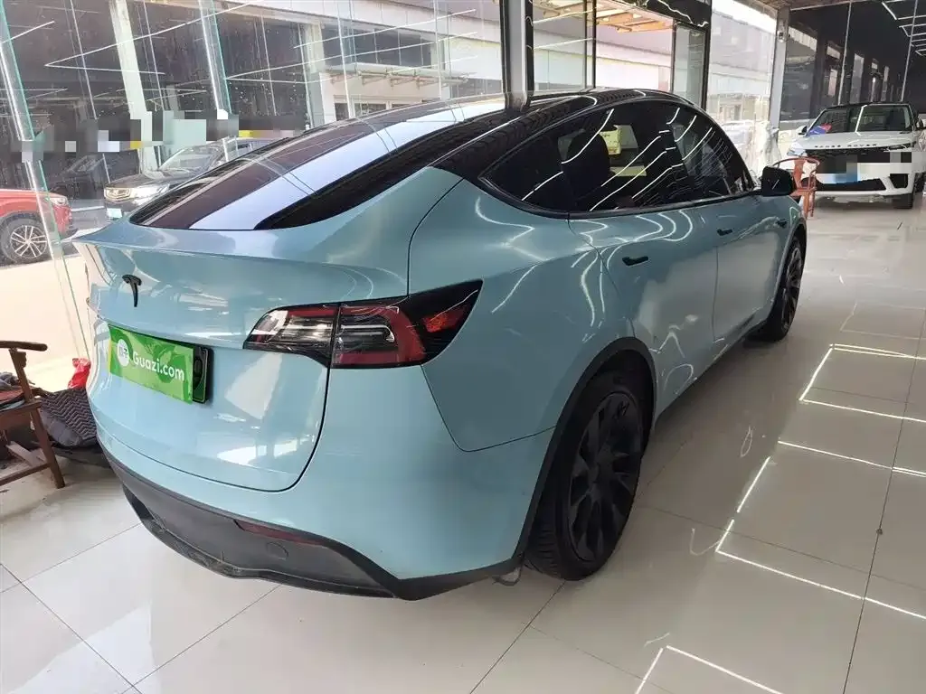 Tesla Model Y — фото 10