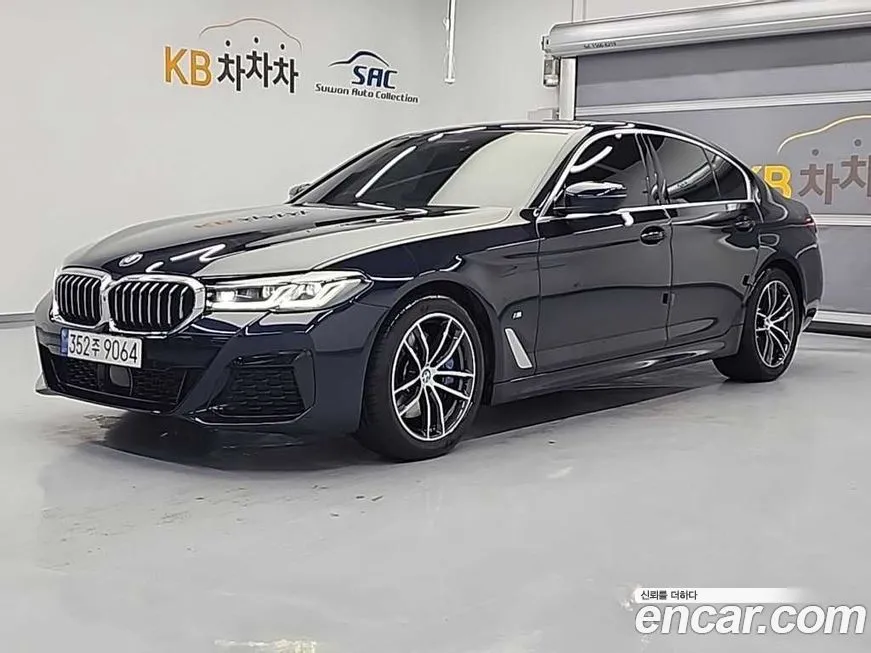 BMW 5-Series — фото 1