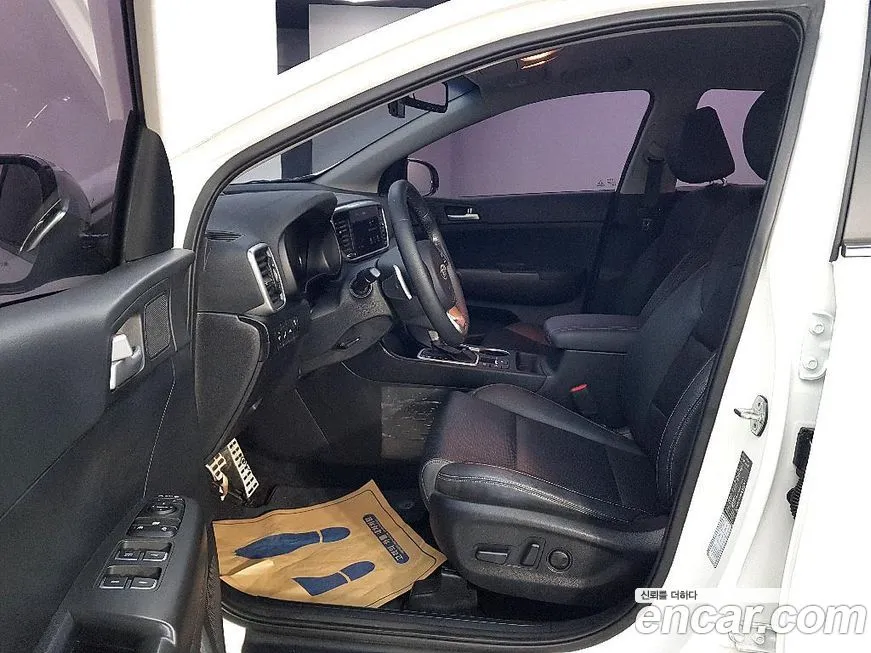 Kia Sportage — фото 10