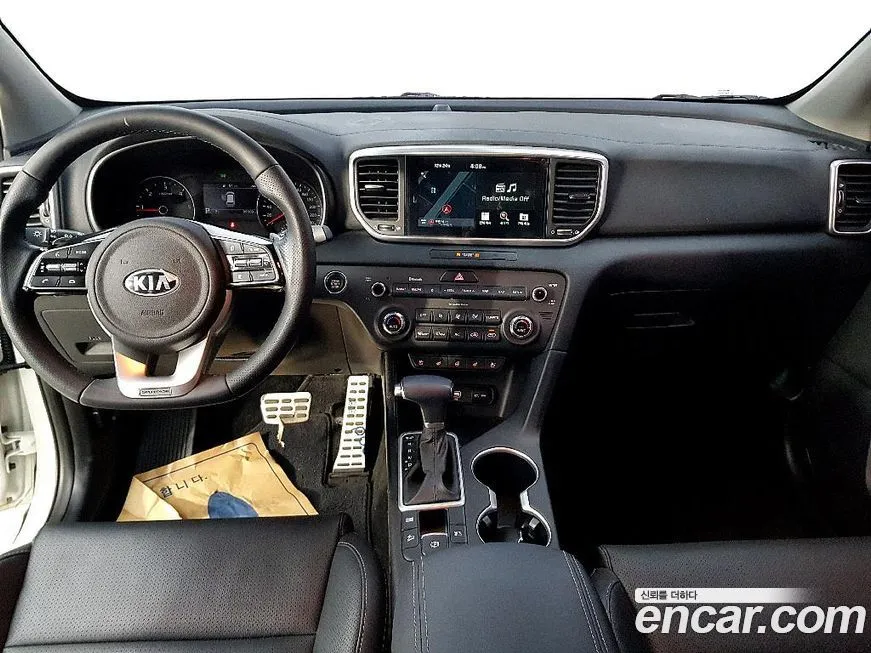 Kia Sportage — фото 7