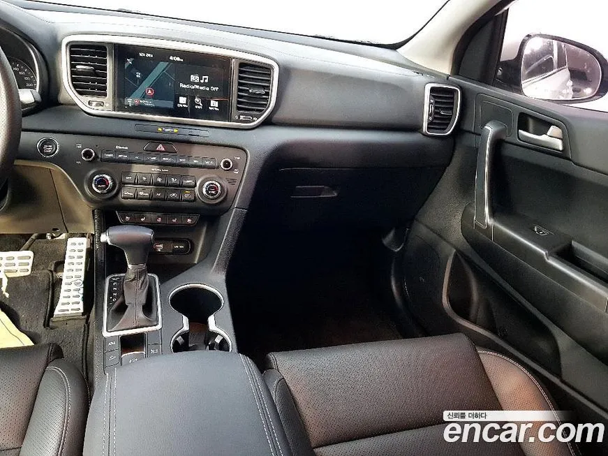 Kia Sportage — фото 9