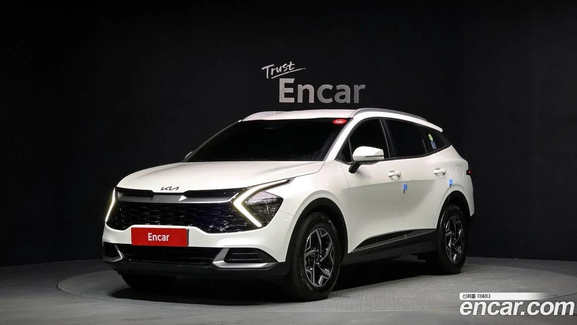 Kia Sportage — фото 1