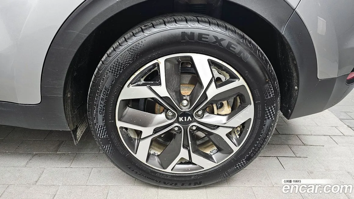Kia Sportage — фото 7