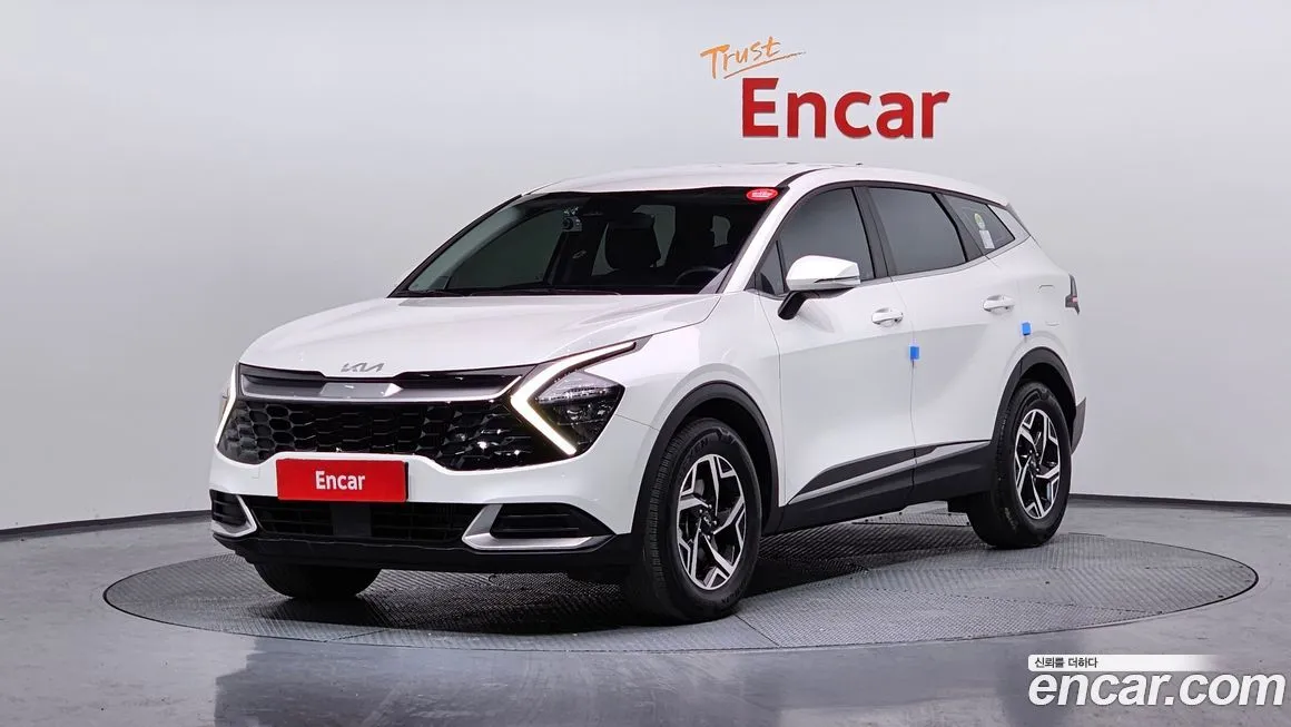 Kia Sportage — фото 1