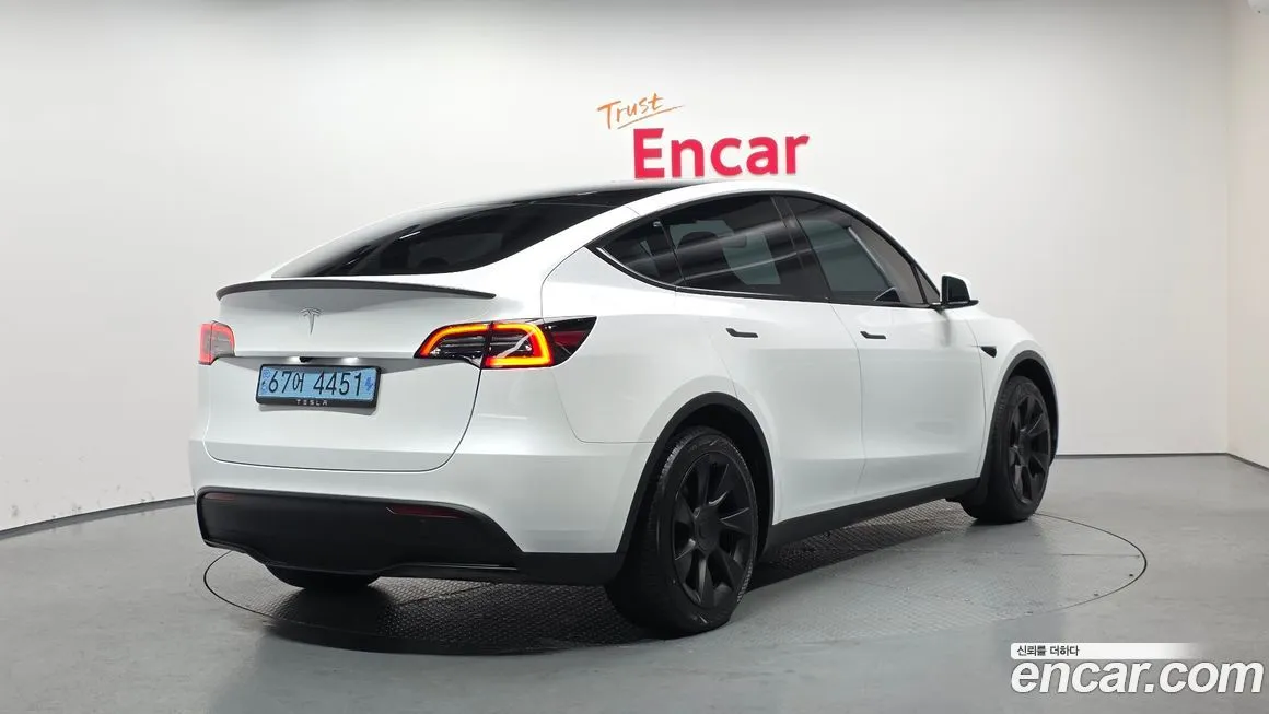 Tesla Model Y — фото 8