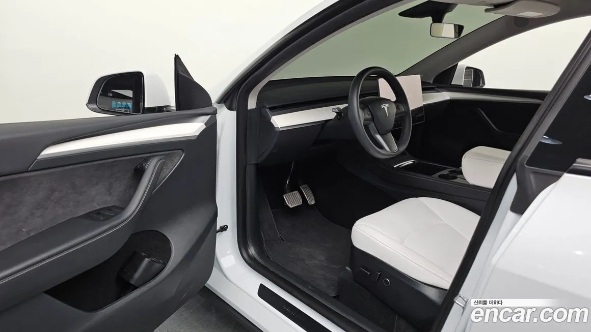 Tesla Model Y — фото 2