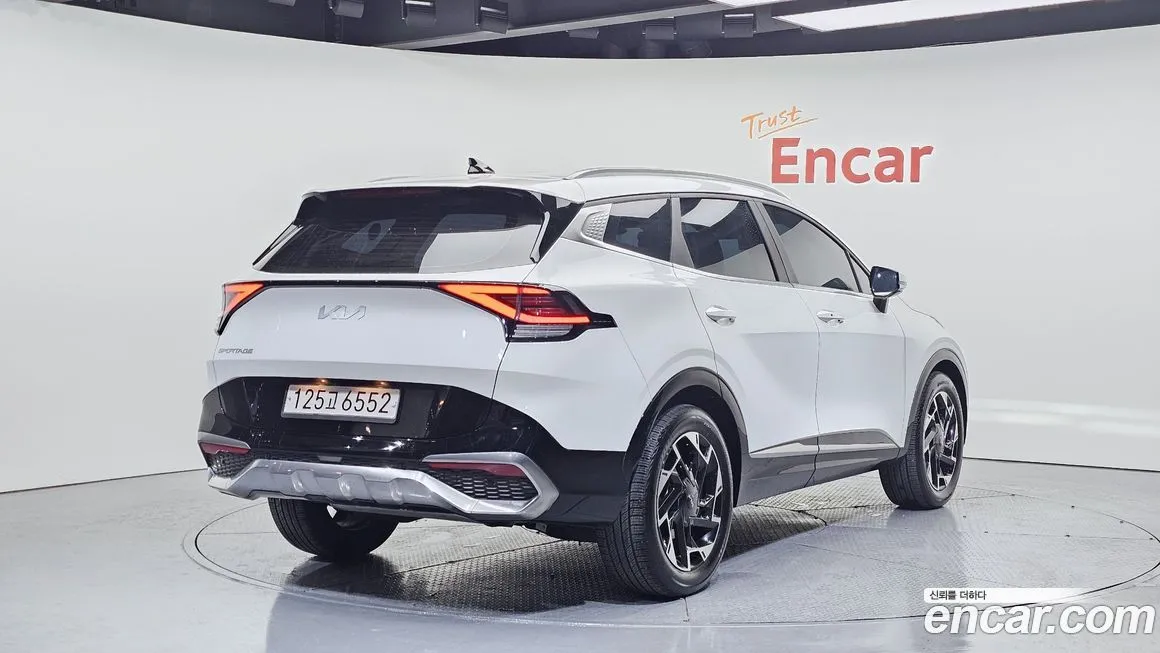 Kia Sportage — фото 9