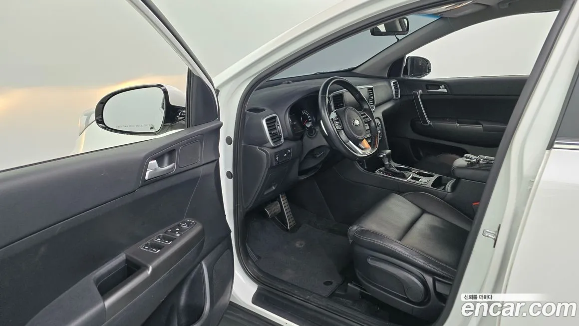 Kia Sportage — фото 10