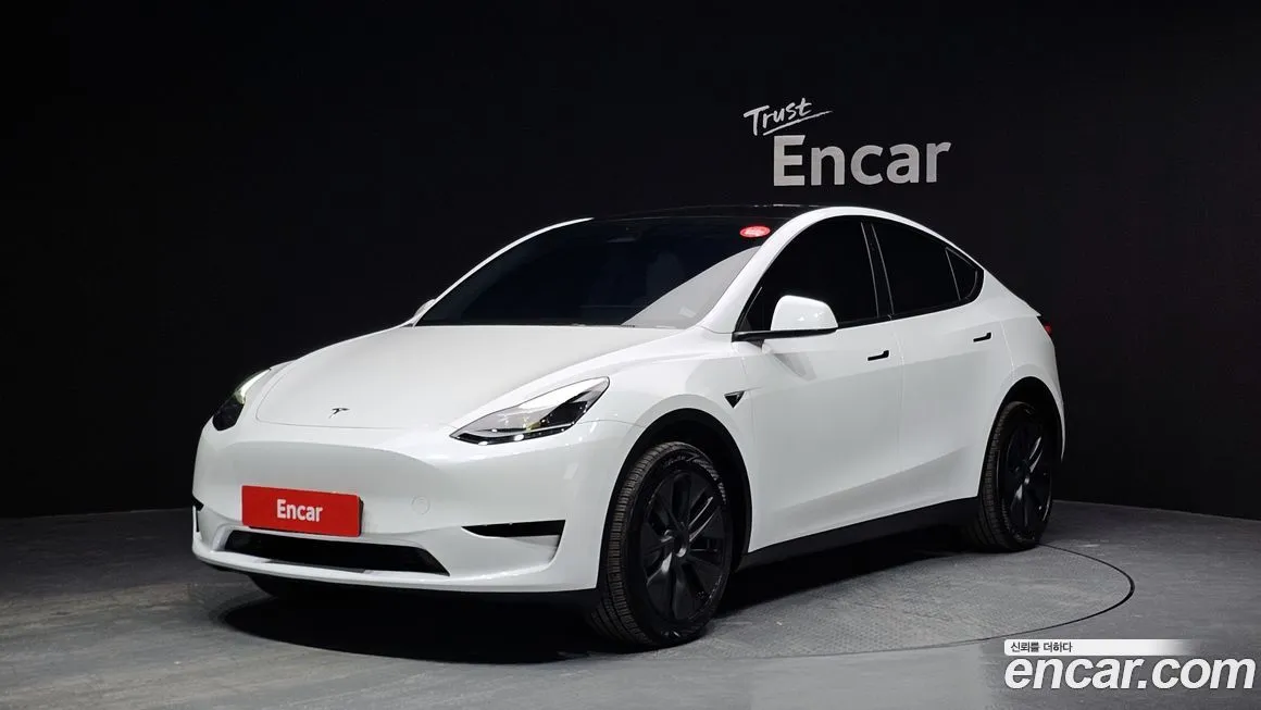 Tesla Model Y — фото 1