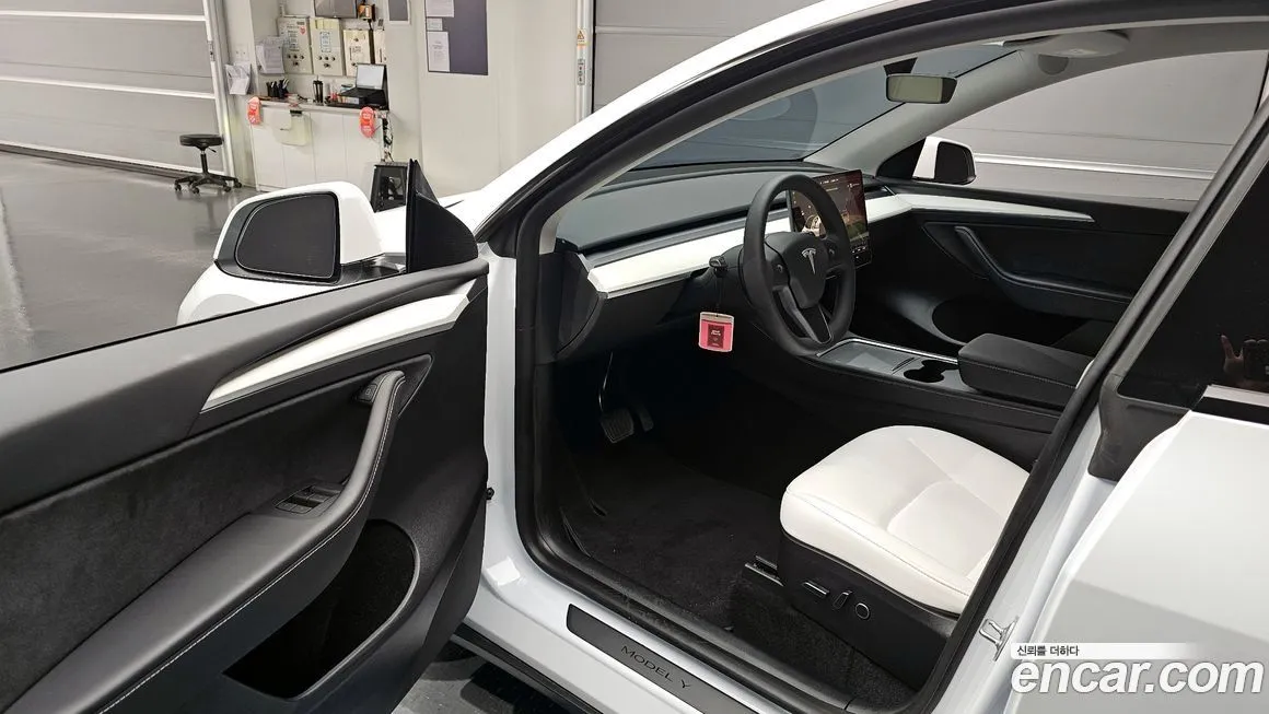 Tesla Model Y — фото 5