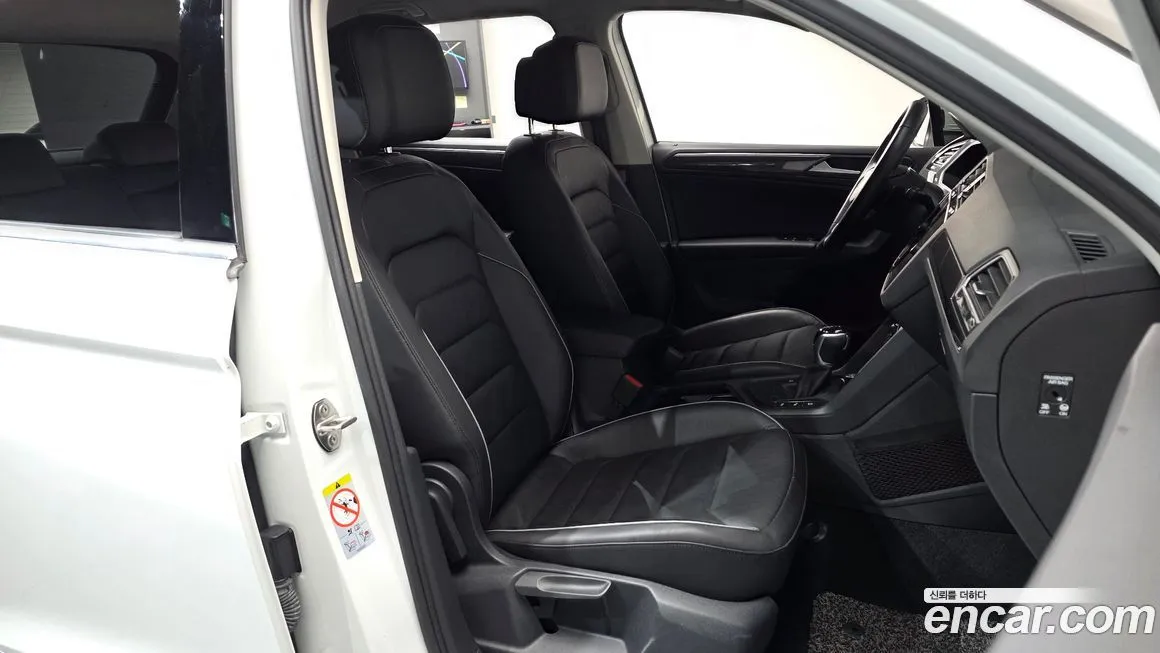 Volkswagen Tiguan — фото 10