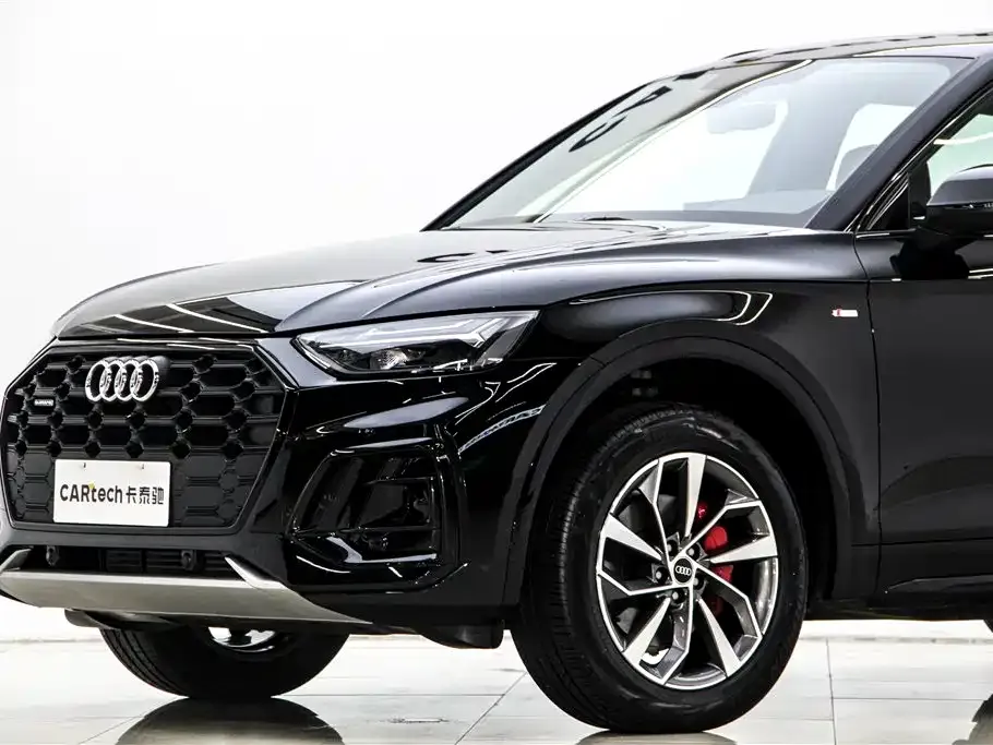 Audi Q5L — фото 10