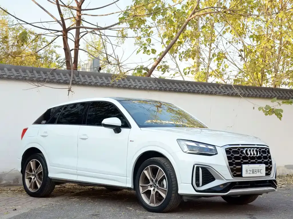 Audi Q2L — фото 7