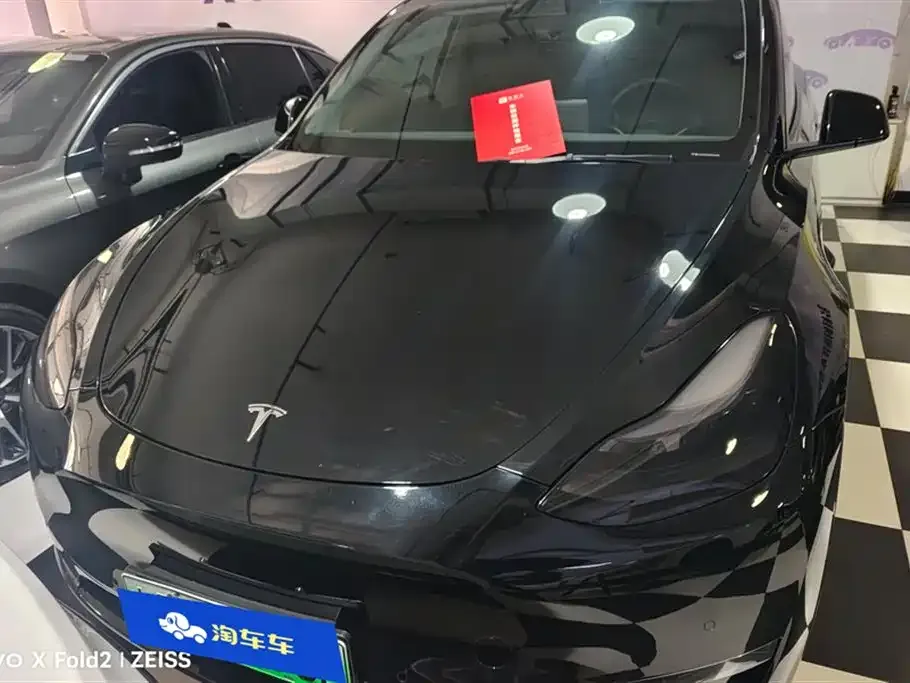 Tesla Model Y — фото 6