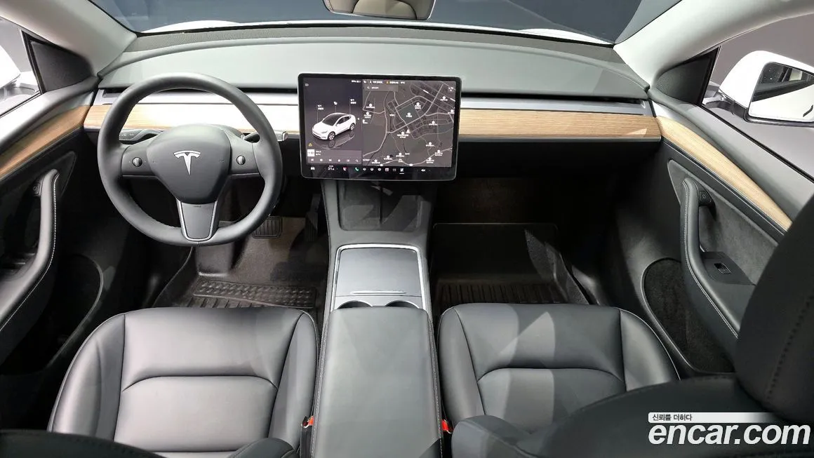 Tesla Model Y — фото 10