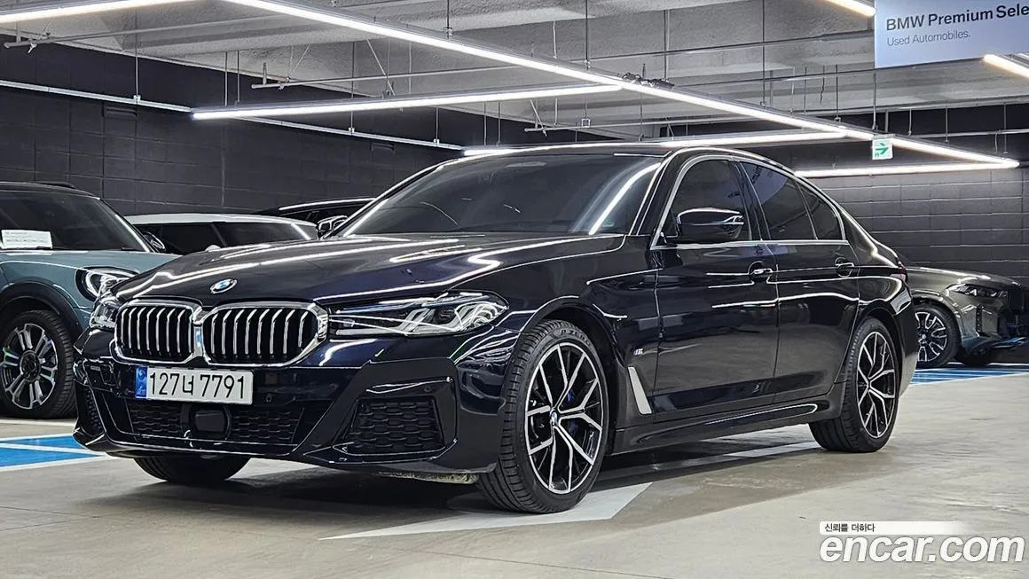 BMW 5-Series — фото 1