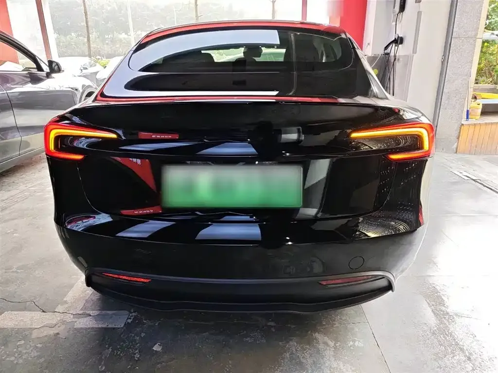 Tesla Model 3 — фото 10