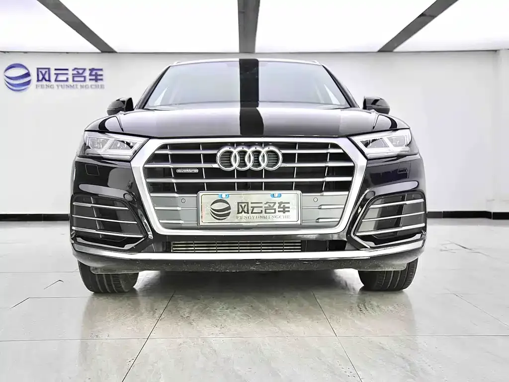 Audi Q5L — фото 8