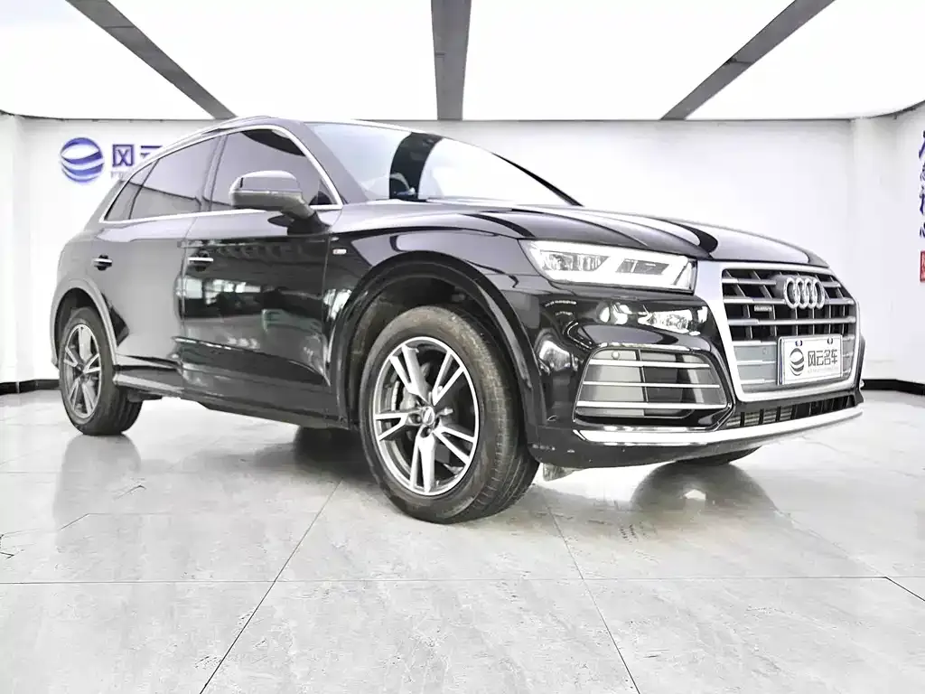 Audi Q5L — фото 6