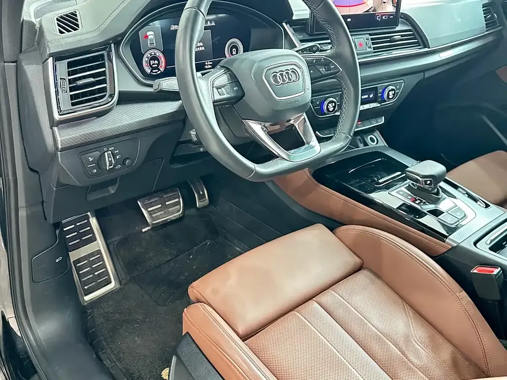 Audi Q5L — фото 6