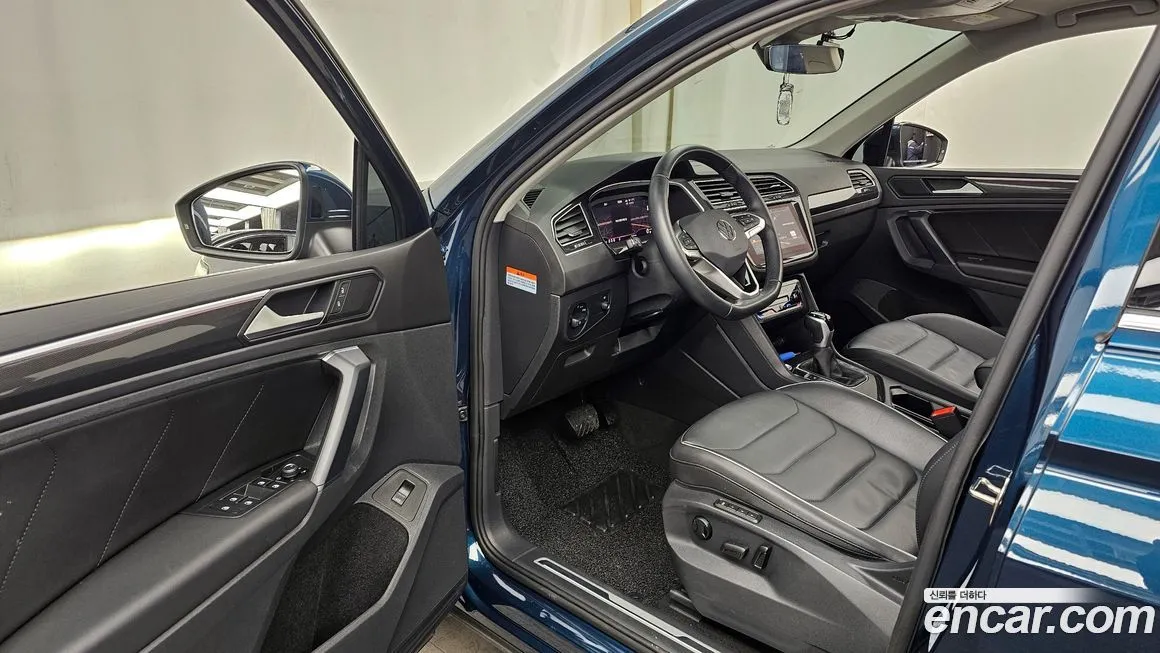 Volkswagen Tiguan — фото 10