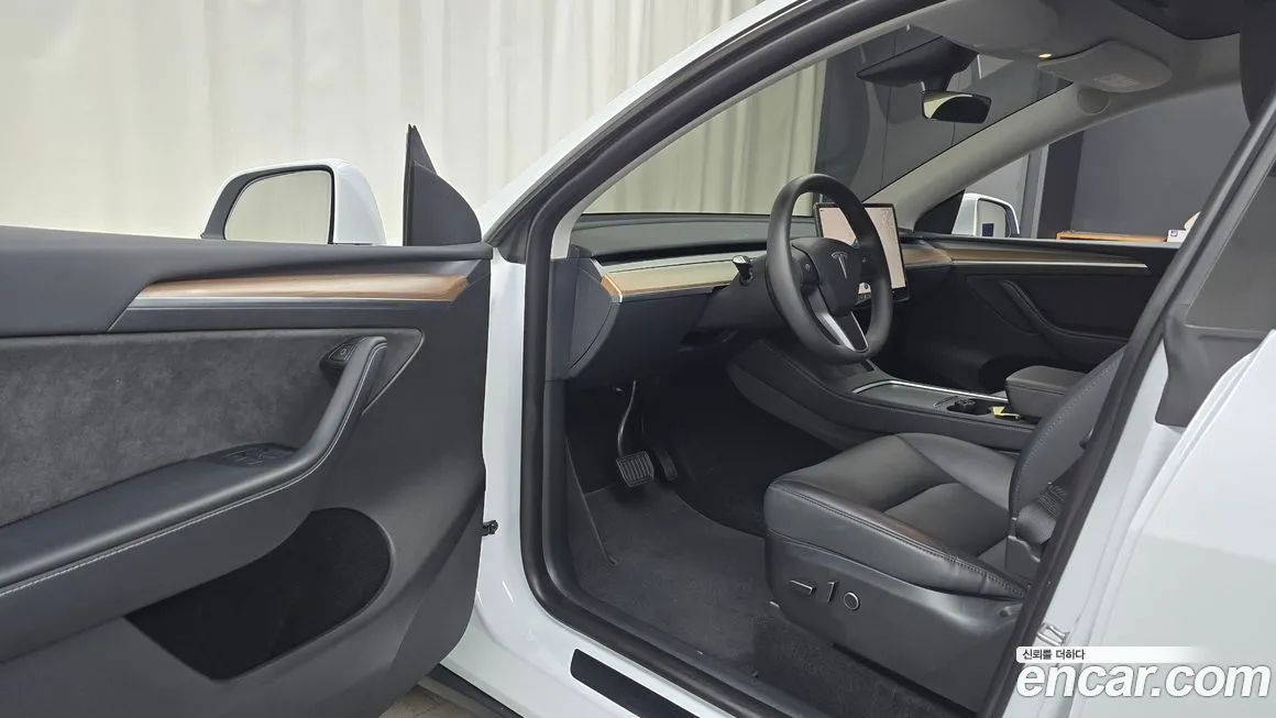 Tesla Model Y — фото 6