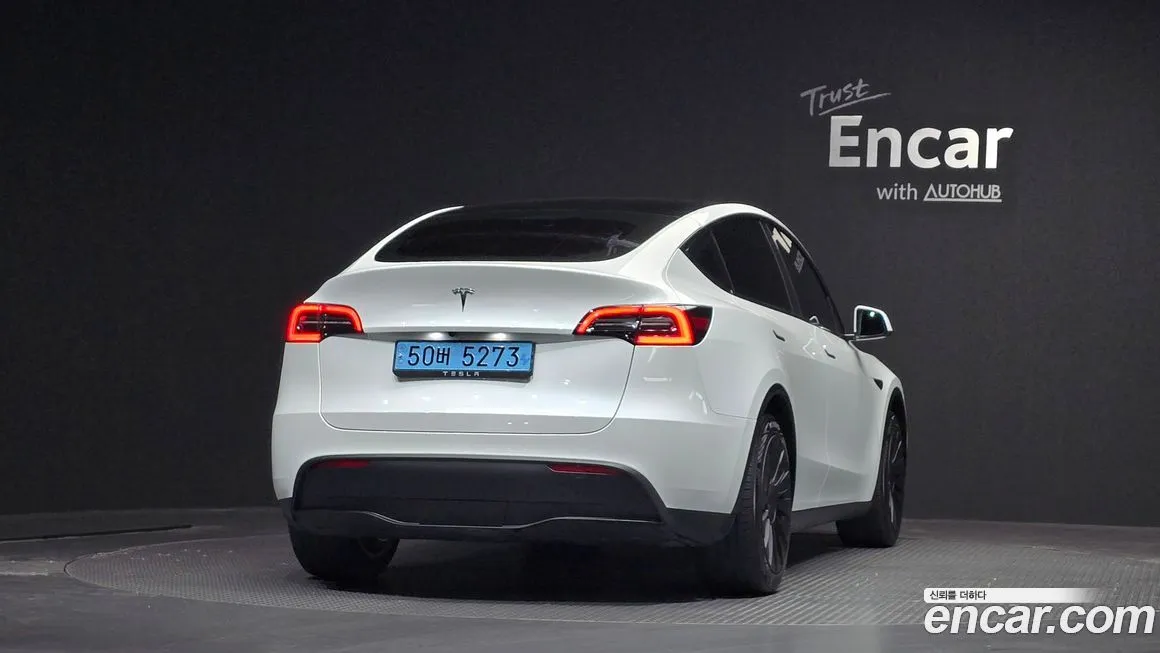 Tesla Model Y — фото 9