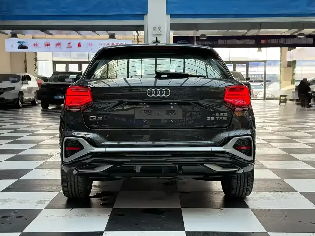 Audi Q2L 2023 из CN, фото 3