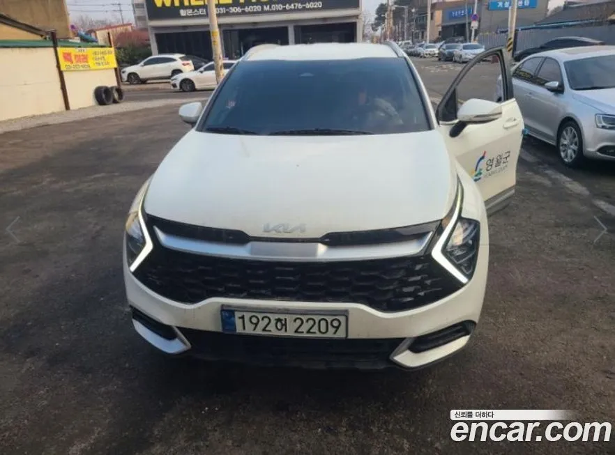 Kia Sportage — фото 1