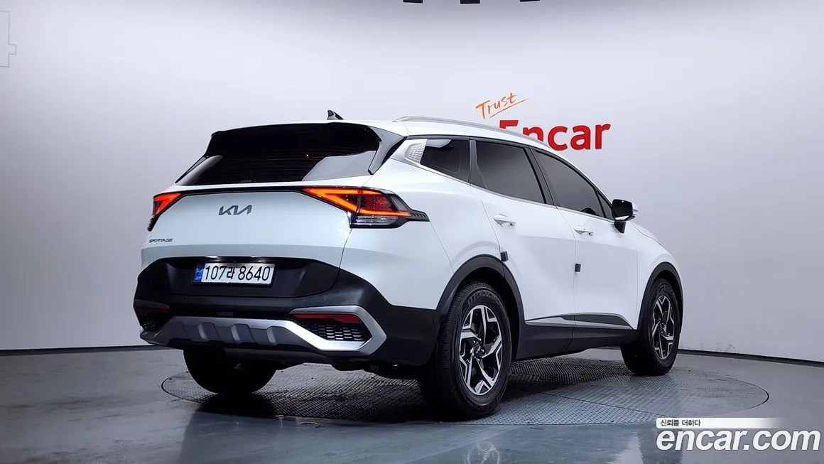 Kia Sportage — фото 7