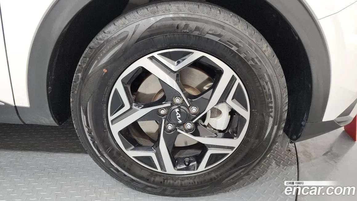 Kia Sportage — фото 10