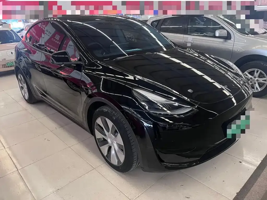 Tesla Model Y — фото 7
