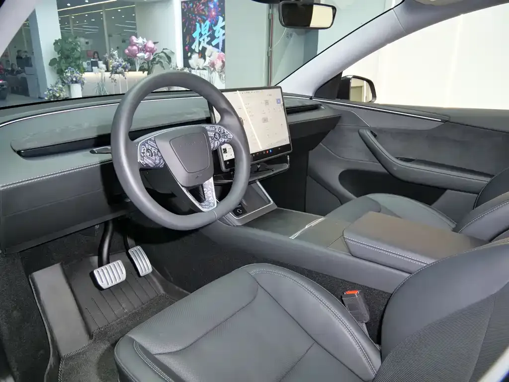 Tesla Model Y — фото 7