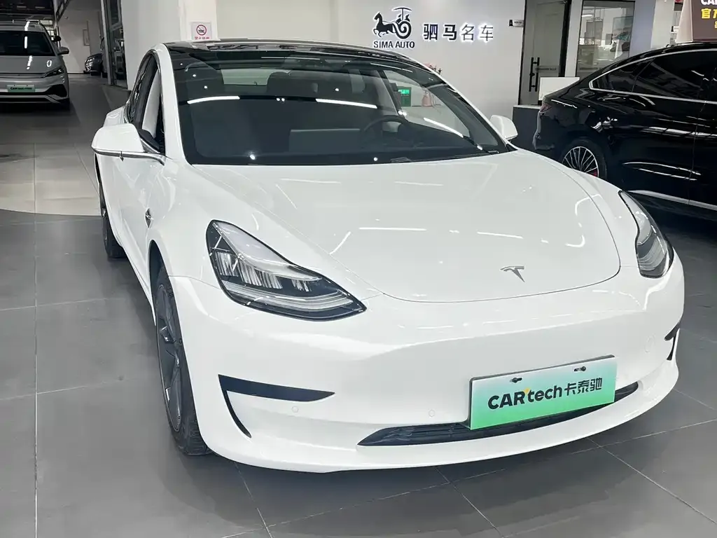 Tesla Model 3 — фото 10