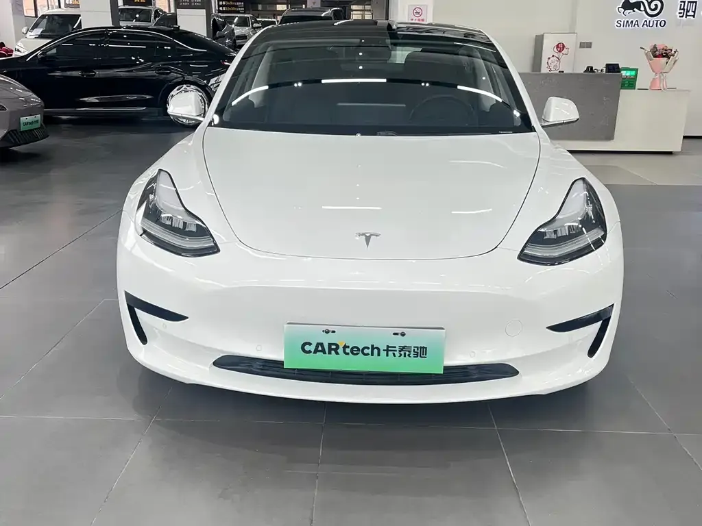 Tesla Model 3 — фото 9
