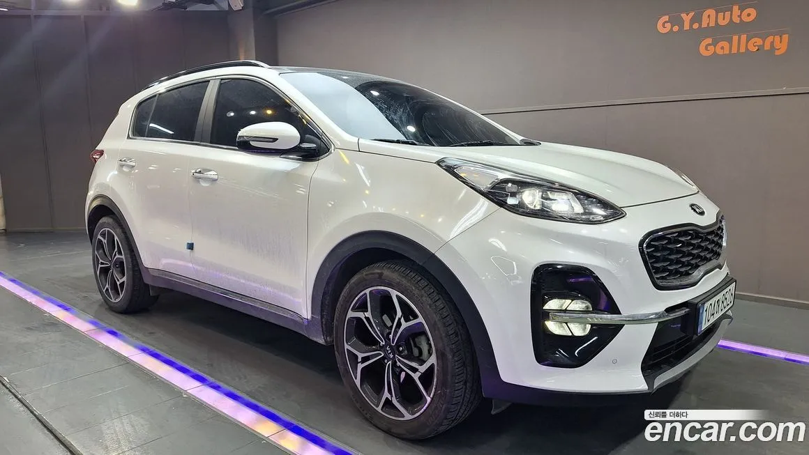 Kia Sportage — фото 1