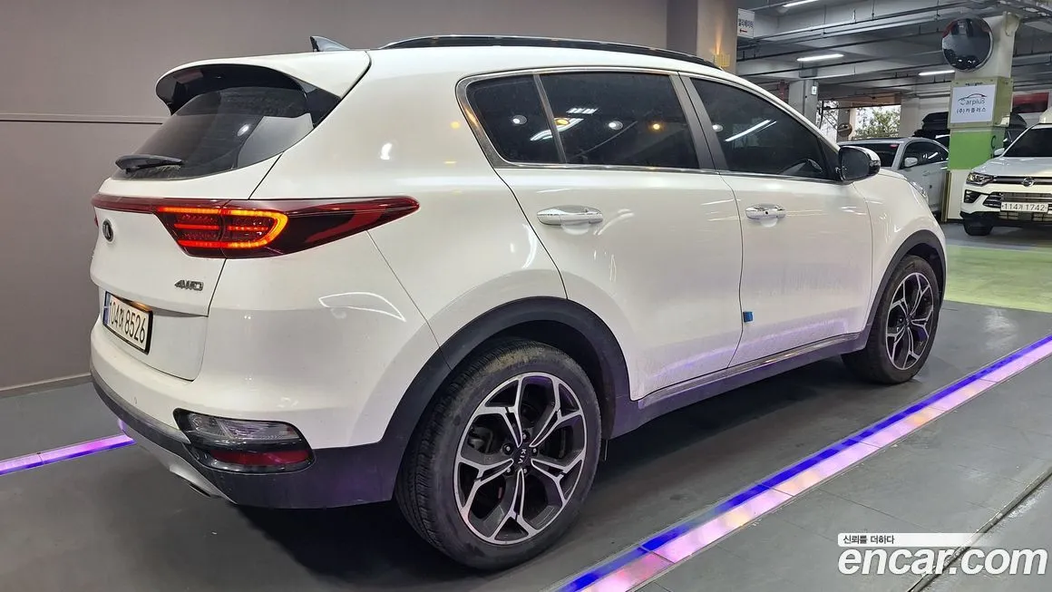 Kia Sportage — фото 7
