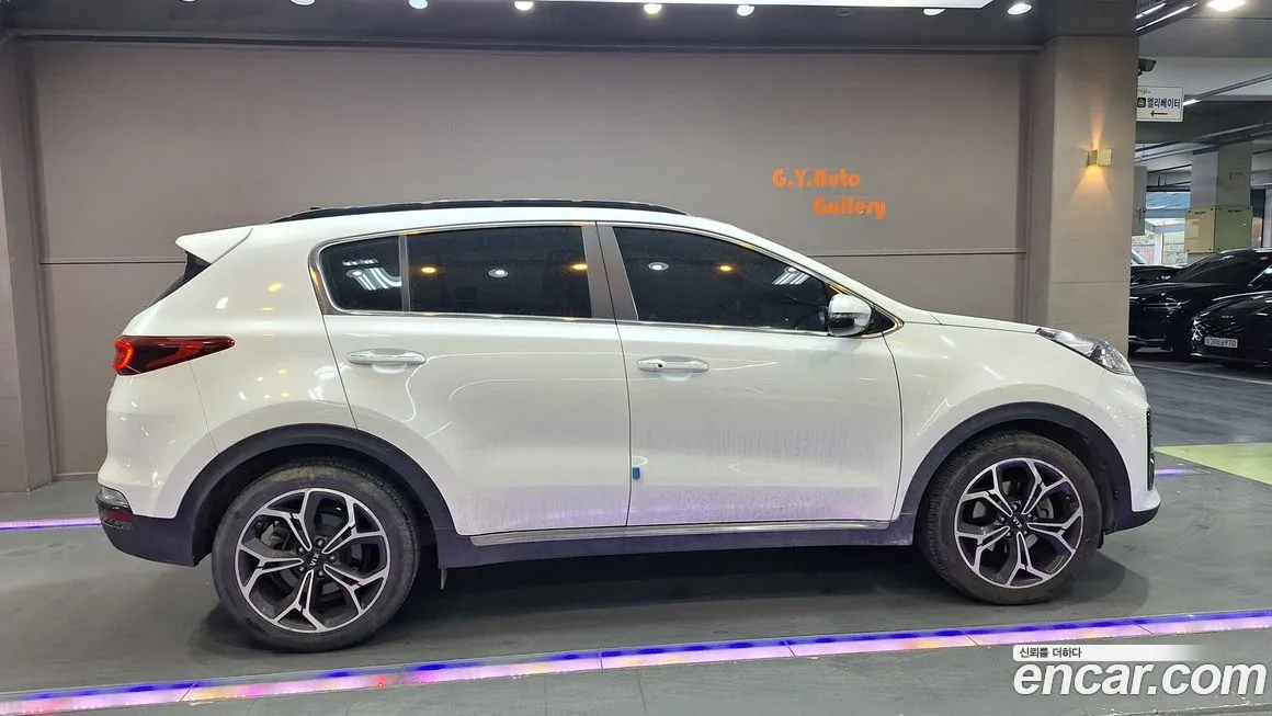 Kia Sportage — фото 8