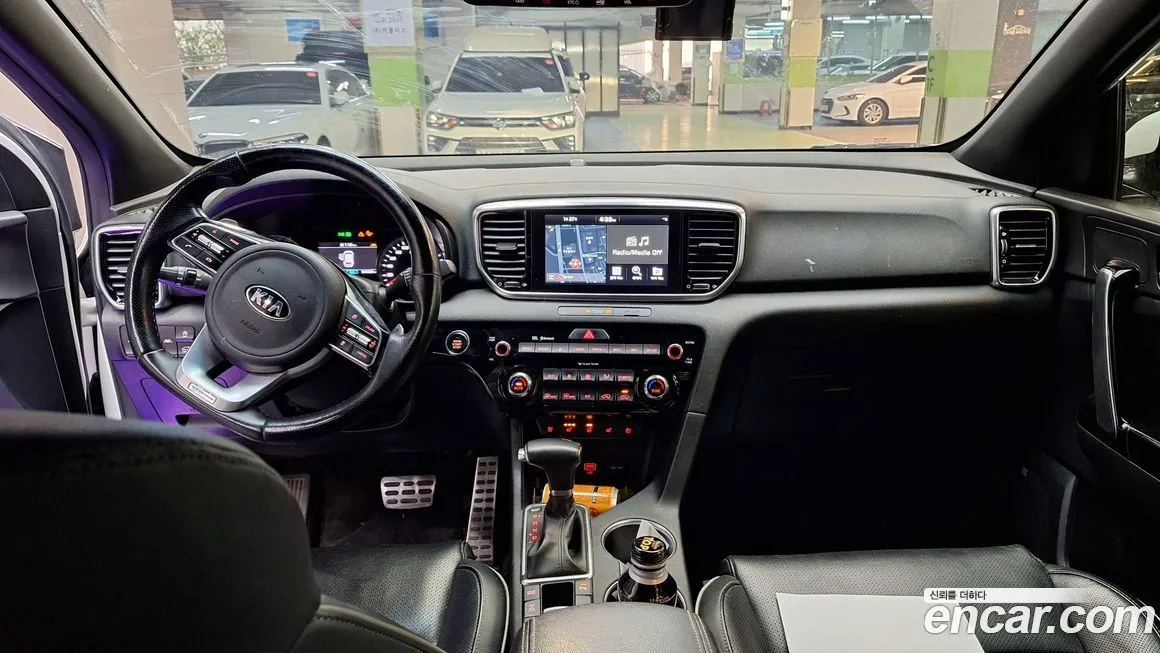 Kia Sportage — фото 10