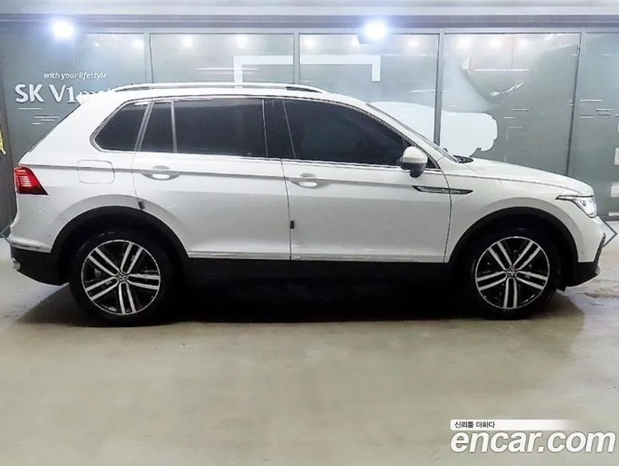 Volkswagen Tiguan — фото 1