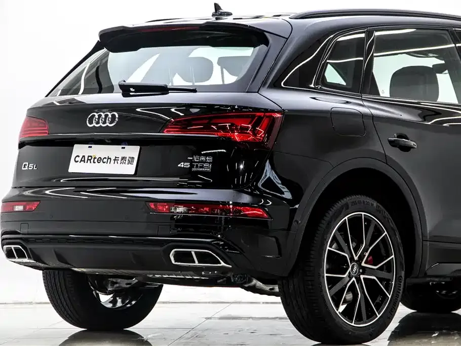 Audi Q5L — фото 9