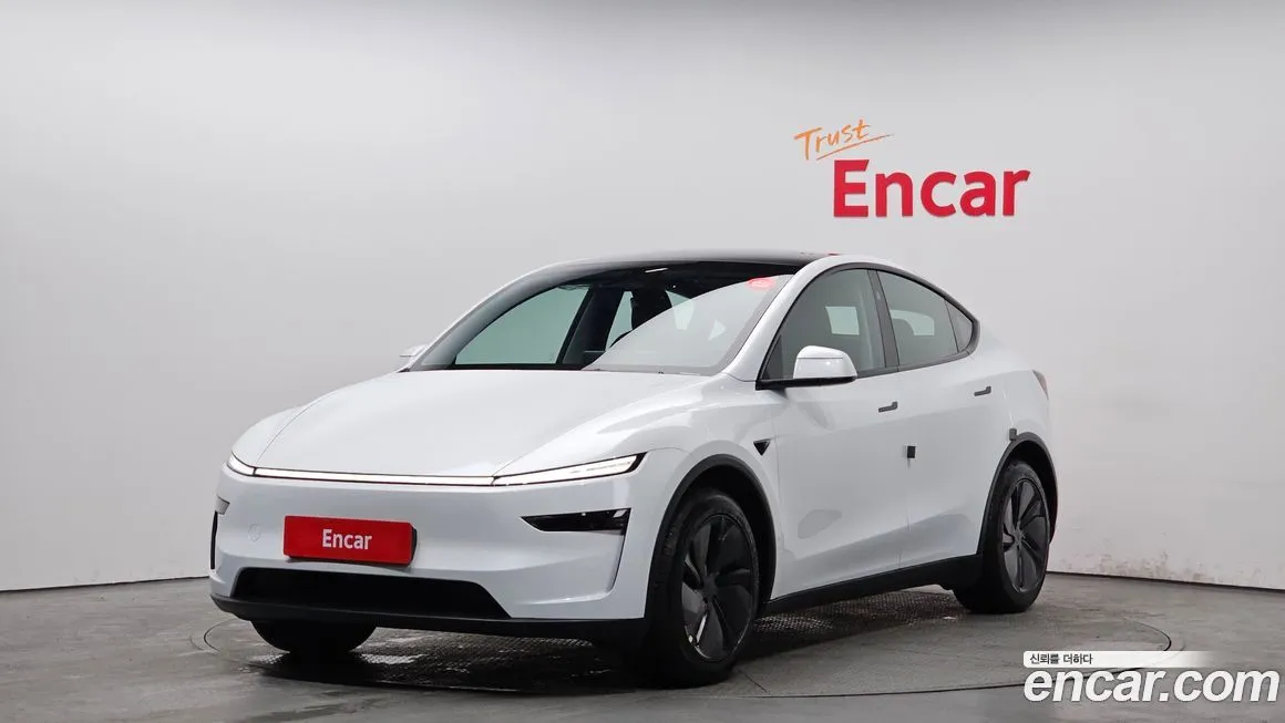 Tesla Model Y — фото 1