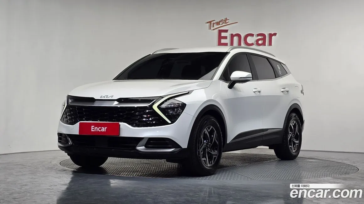 Kia Sportage — фото 1